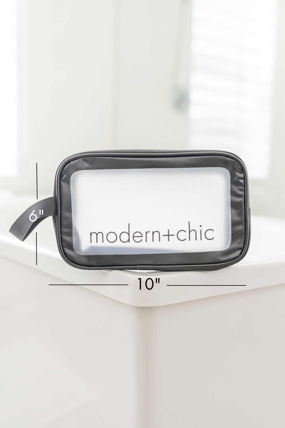 A small rectangular clear cosmetic bag.