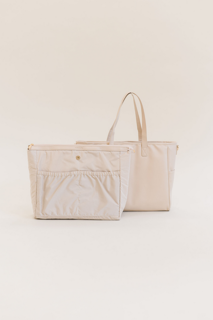 A cream tote with a matching insert.