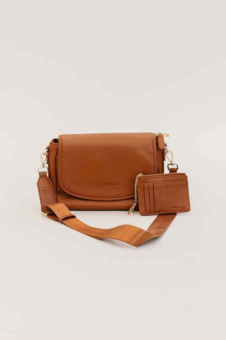 A camel crossbody and matching credit card wallet.