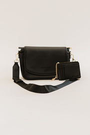 A black crossbody bag and matching wallet.