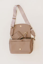 A taupe crossbody and matching wallet.