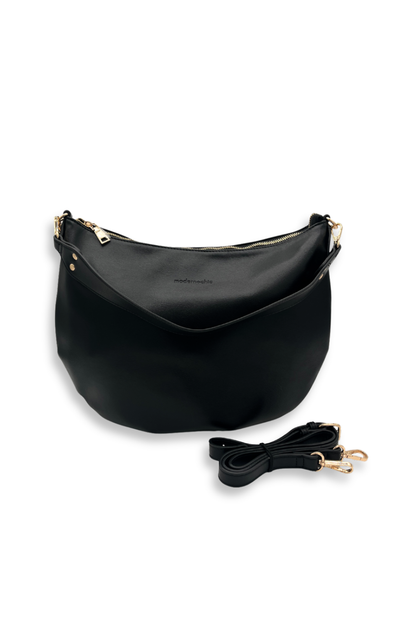 A black vegan leather Modern+Chic Savannah Slouchy Tote – Women's Shoulder & Crossbody Bag on a white background. 