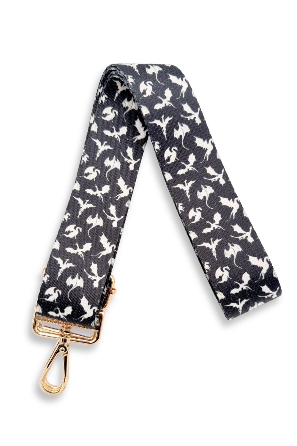 Black dragon-patterned strap with gold clasp on a white background