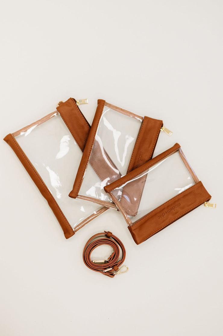 Three clear pouches on a white backdrop.