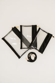 Three black and clear bags on a white backdrop.
