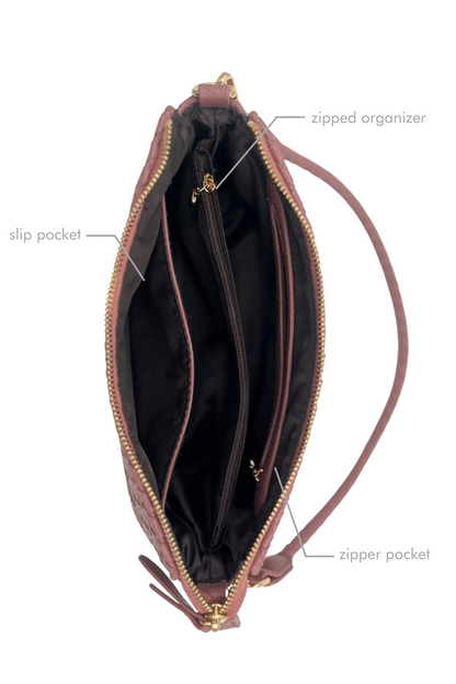 Open leather  Modern + Chic Elle Woven Crossbody Bag for Women on a white background with labeled compartments on a white background.