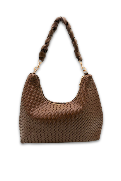 Brown woven handbag with braided handle on a white background