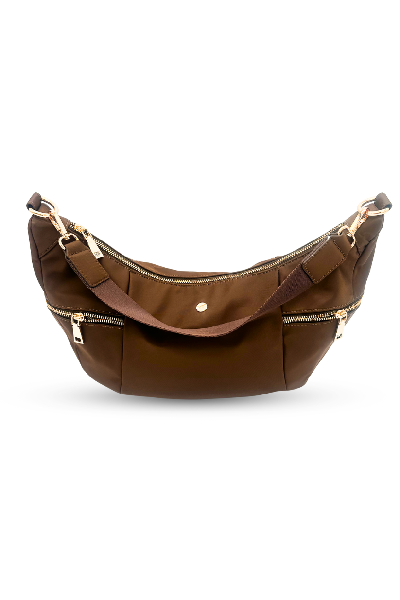 Brown Modern + Chic Parker Crescent Crossbody Bag for Women on white background. 