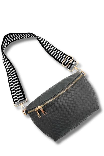 Gray woven handbag with a striped strap on a white background