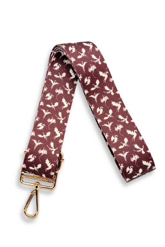 white and wine colored dragon-patterned strap with gold clasp on a white background