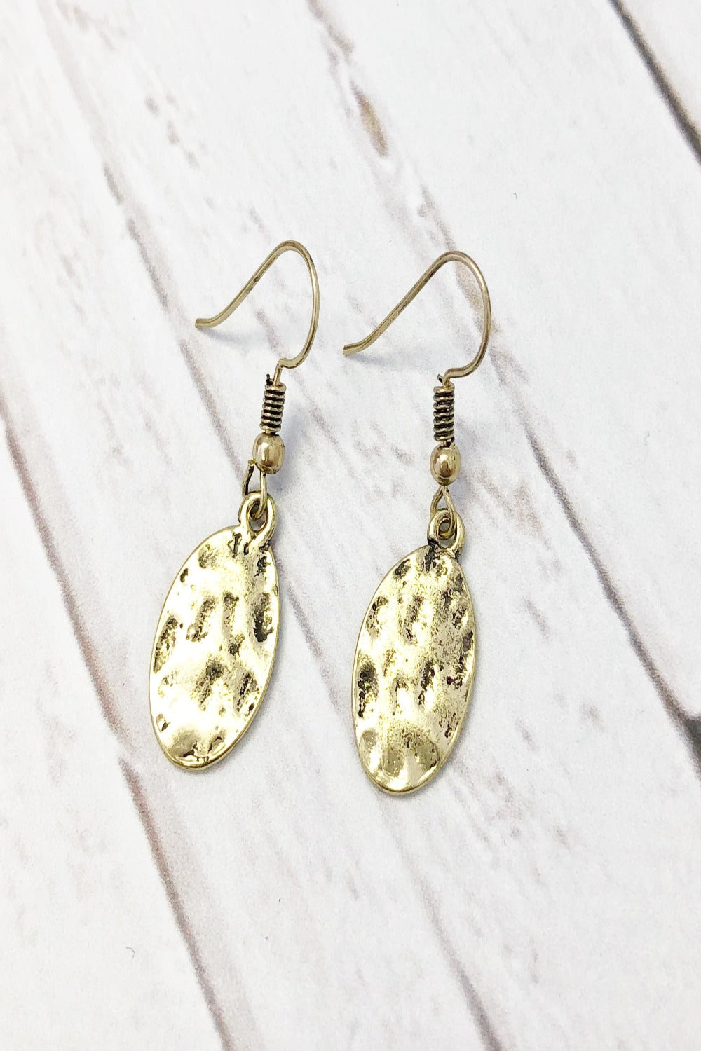 gold hammered oval earrings - final sale